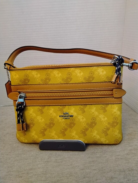 Coach Handbags - Coach Galllery Horse & Carraige Yellow Print with Tan Leather Trim